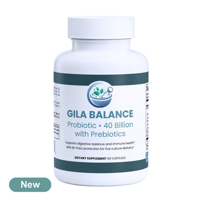 A white plastic bottle of Gila Balance Probiotic dietary supplement with a white cap, featuring a dark green and white label. A green 'New' badge is visible in the bottom-left corner on a plain white background.