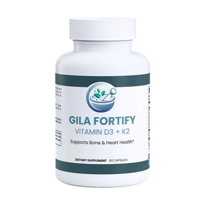 A white plastic bottle of Gila Fortify Vitamin D3 + K2 dietary supplement with a white cap, featuring a white label with dark green bands and a blue logo.