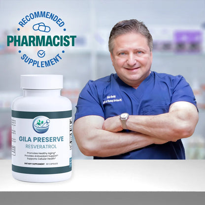 Man in blue scrubs standing next to a bottle of Gila Preserve Resveratrol with a 'Recommended Pharmacist Supplement' label.