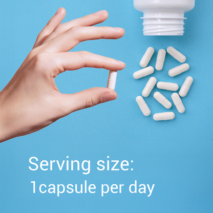 Hand holding a white capsule with text about serving size on a blue background
