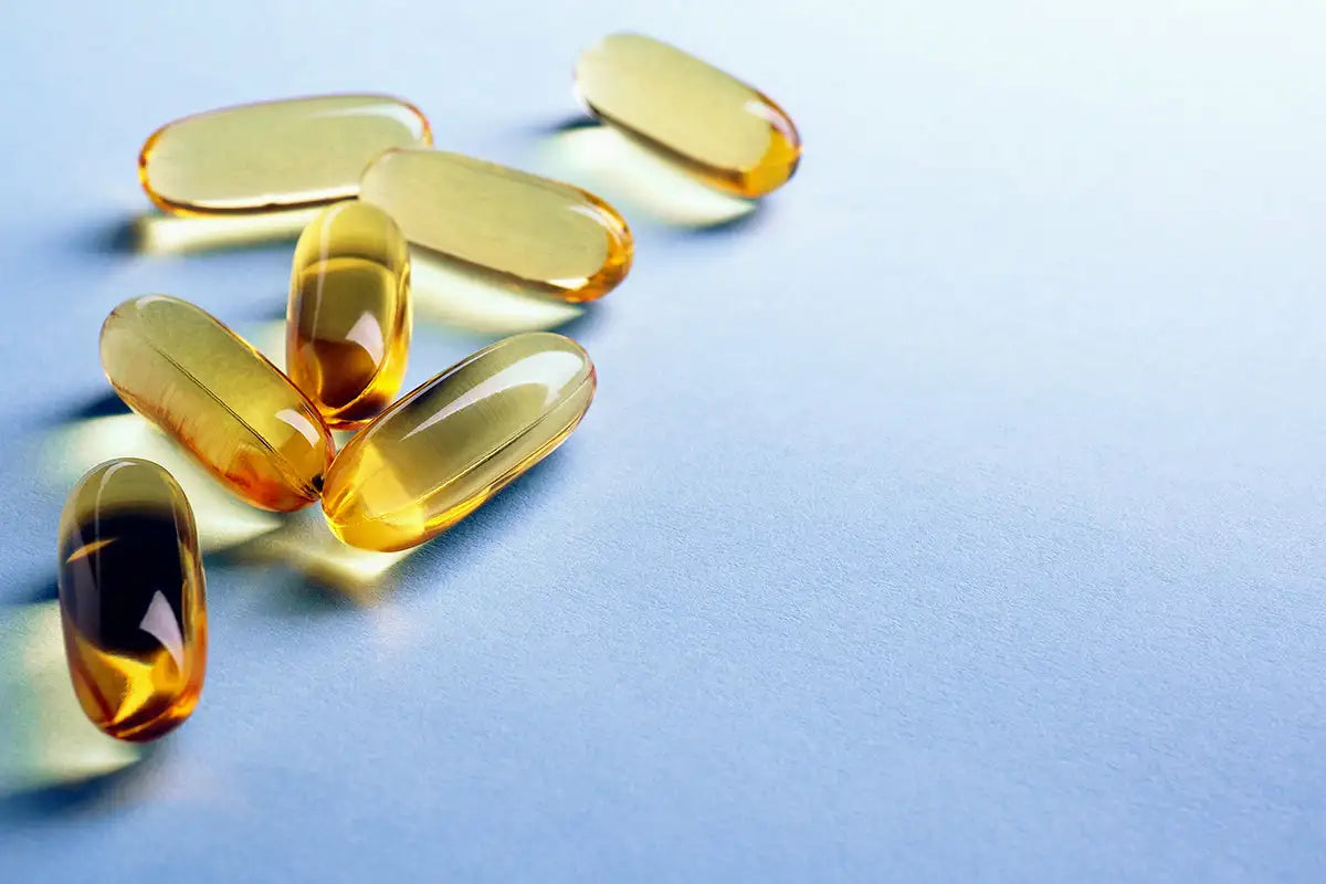 Yellow capsules on a blue background